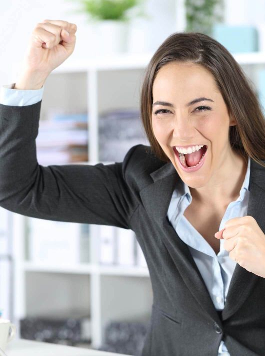 excited executive celebrates news looking camera office excited executive woman celebrates good news looking camera sitting 182470744 meet 543f61f1